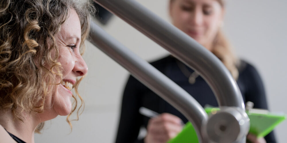 Women weight training in gym